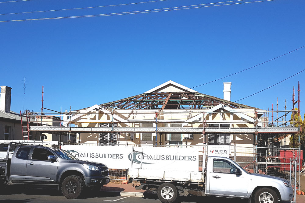 Split image of old house elevation, showing old tile roof before and new Colorbond roof after